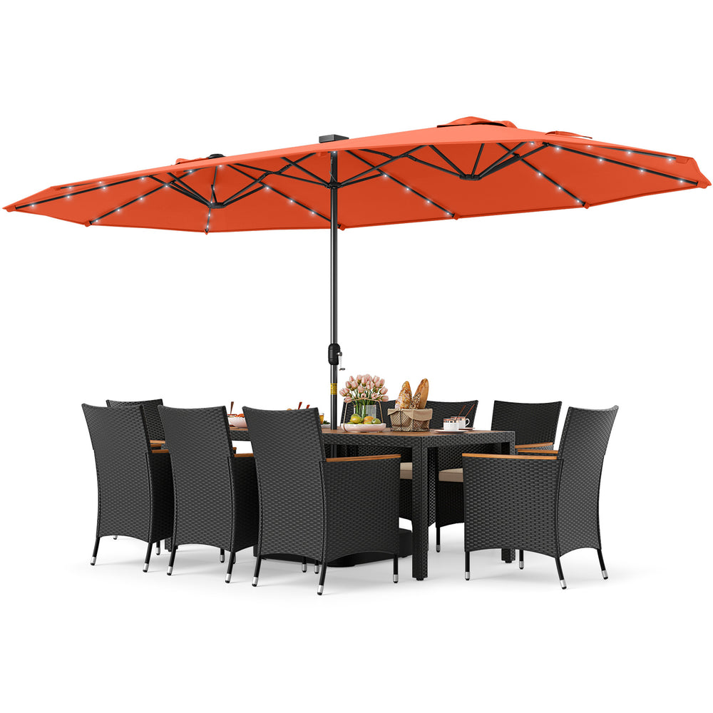 11-piece patio dining set featuring a large orange LED umbrella, hand-woven PE rattan chairs, and soft cushions for.