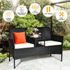 Wicker patio conversation set with removable cushions, tempered glass table, and ergonomic design for outdoor.