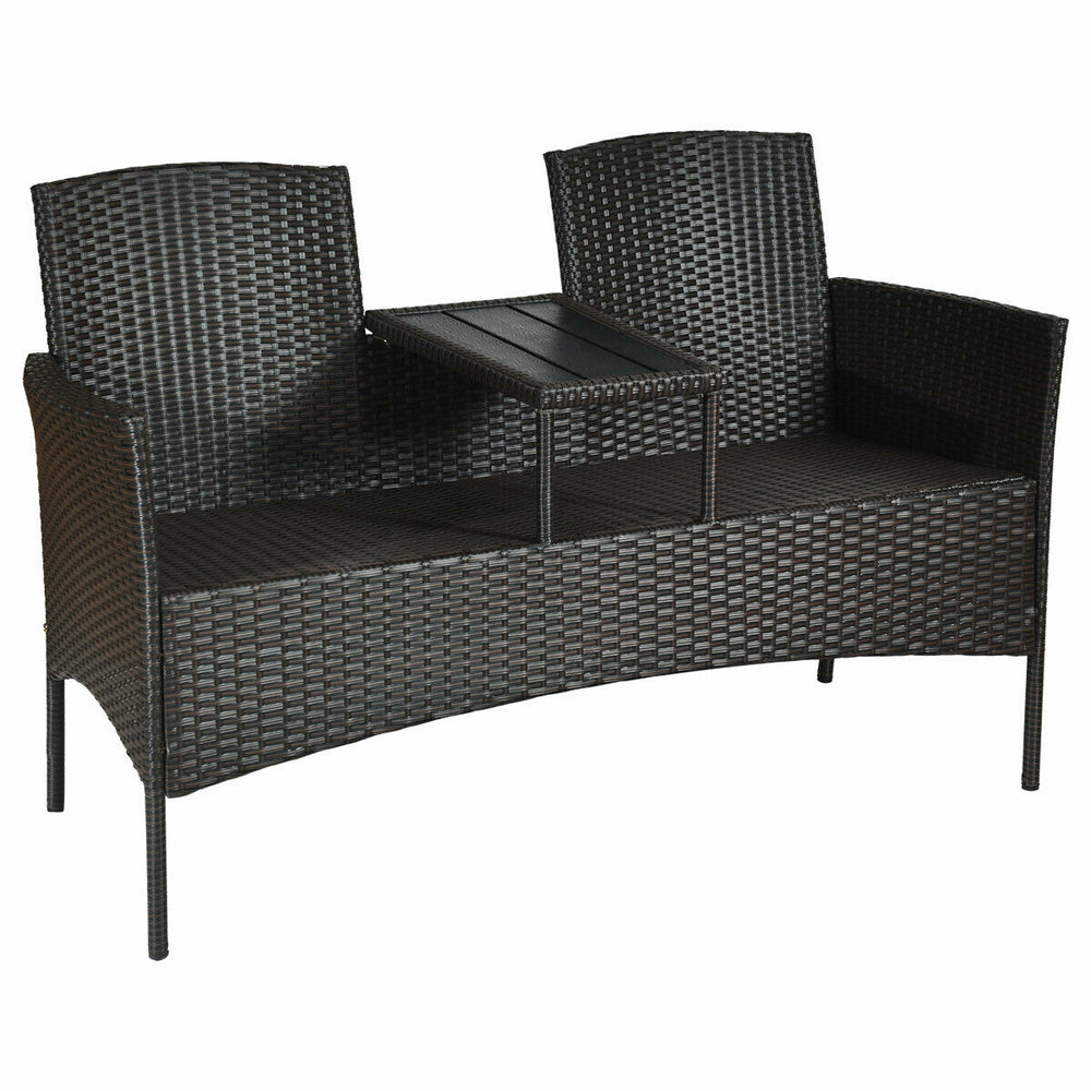 Modern patio conversation set featuring a built-in trapezoid coffee table and removable cushions for outdoor comfort.