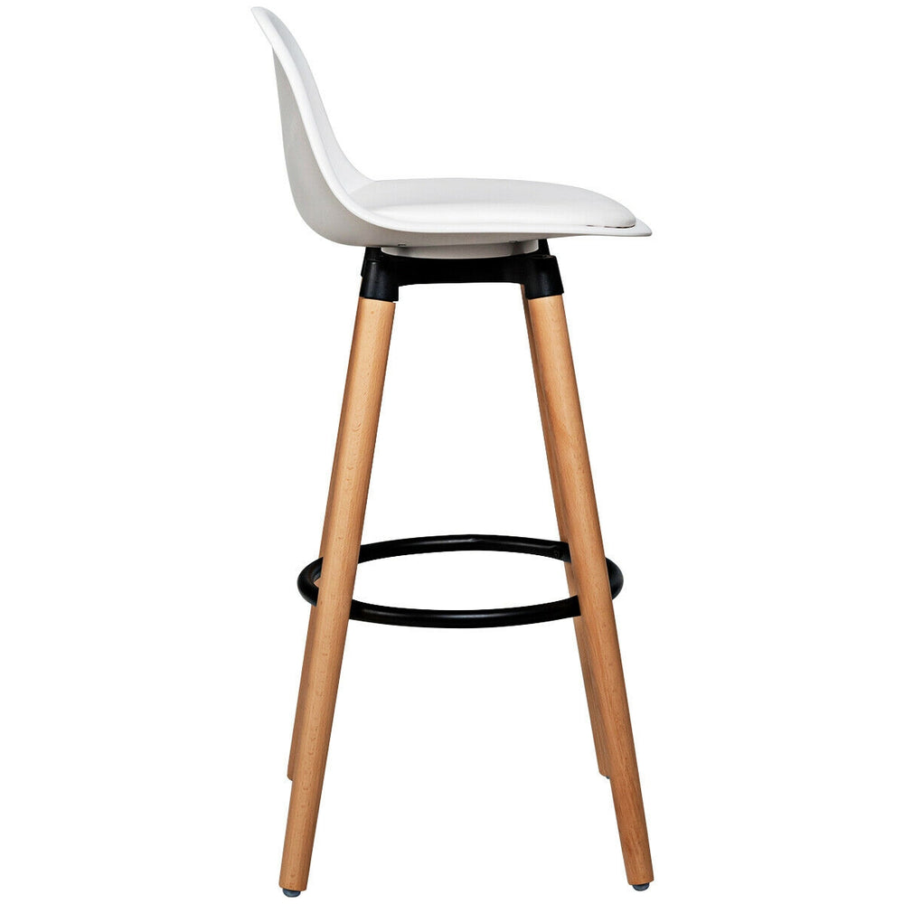 White mid-century barstool with beech wood legs and metal footrest, ideal for dining rooms or home bars.