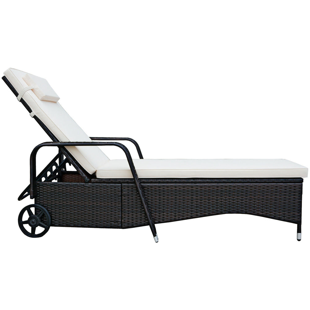 Cushioned outdoor recliner chaise lounge with adjustable backrest and wheels, made of weather-resistant PE rattan.