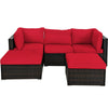 Side view of the L-shaped rattan sofa set with red cushions, showcasing its sturdy steel frame and stylish design for.