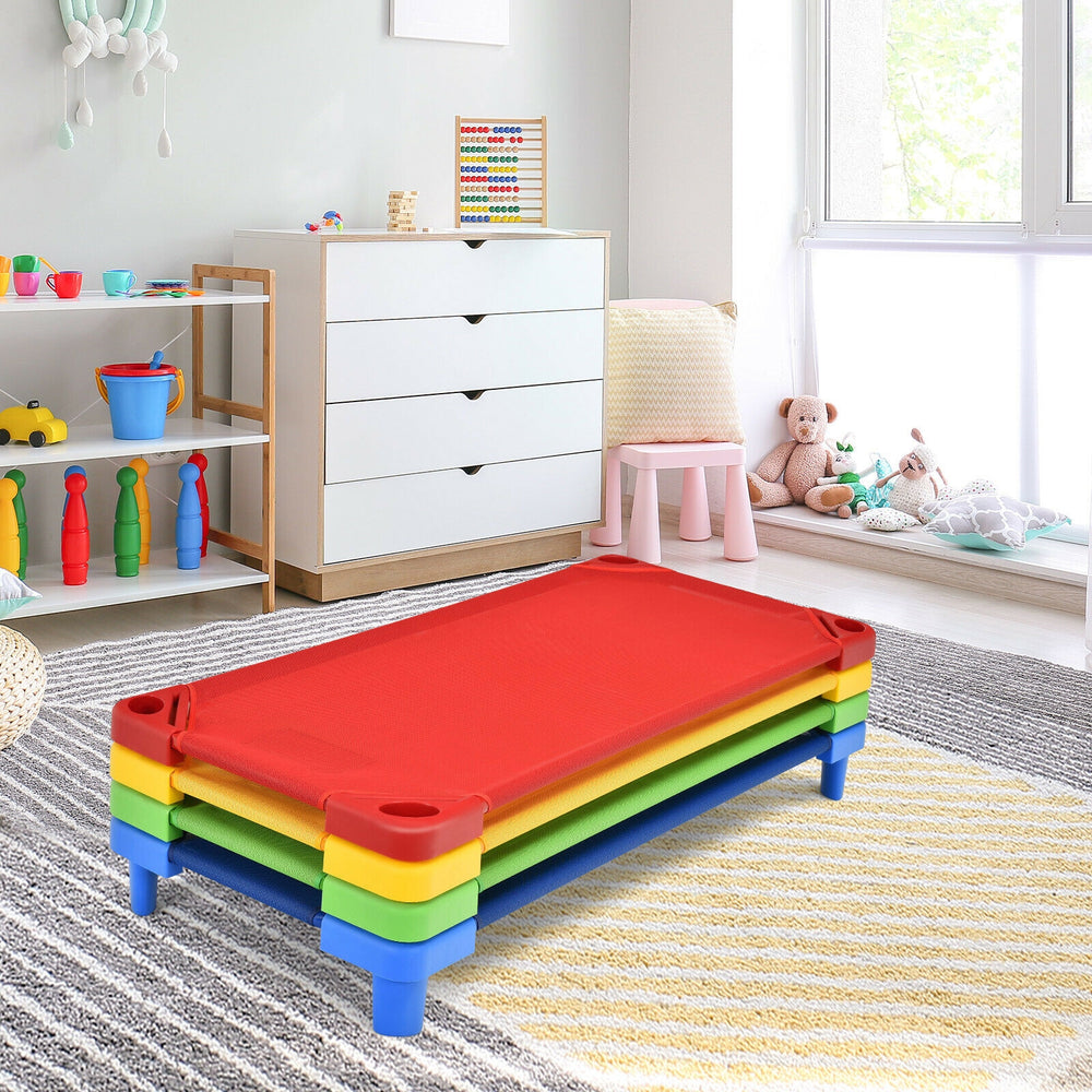 Colorful stackable kids naptime cots with a heavy-duty steel frame, perfect for preschools and playrooms.