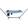 Hammock chair stand set with blue cotton swing, pillow, and cup holder for indoor or outdoor relaxation.