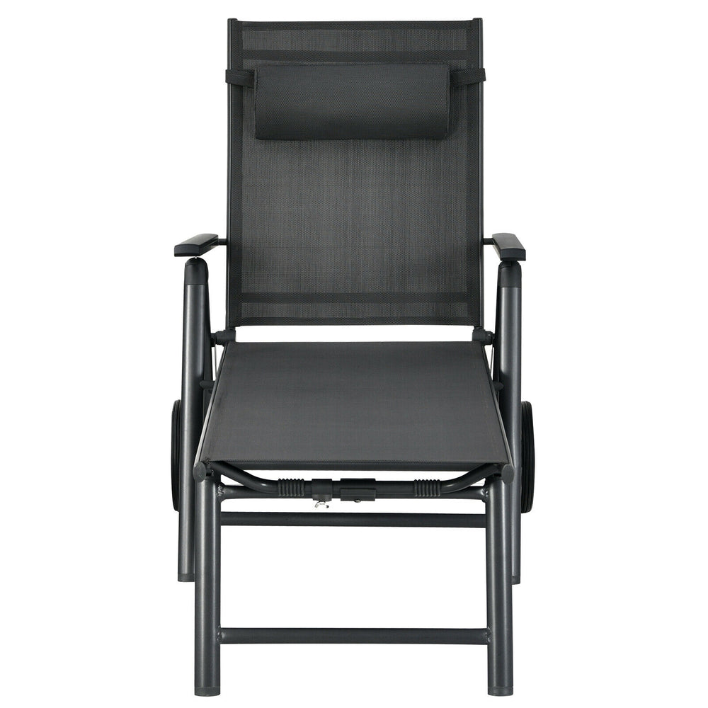 Gray patio lounge chair with wheels, adjustable backrest, and neck pillow for comfortable outdoor relaxation.