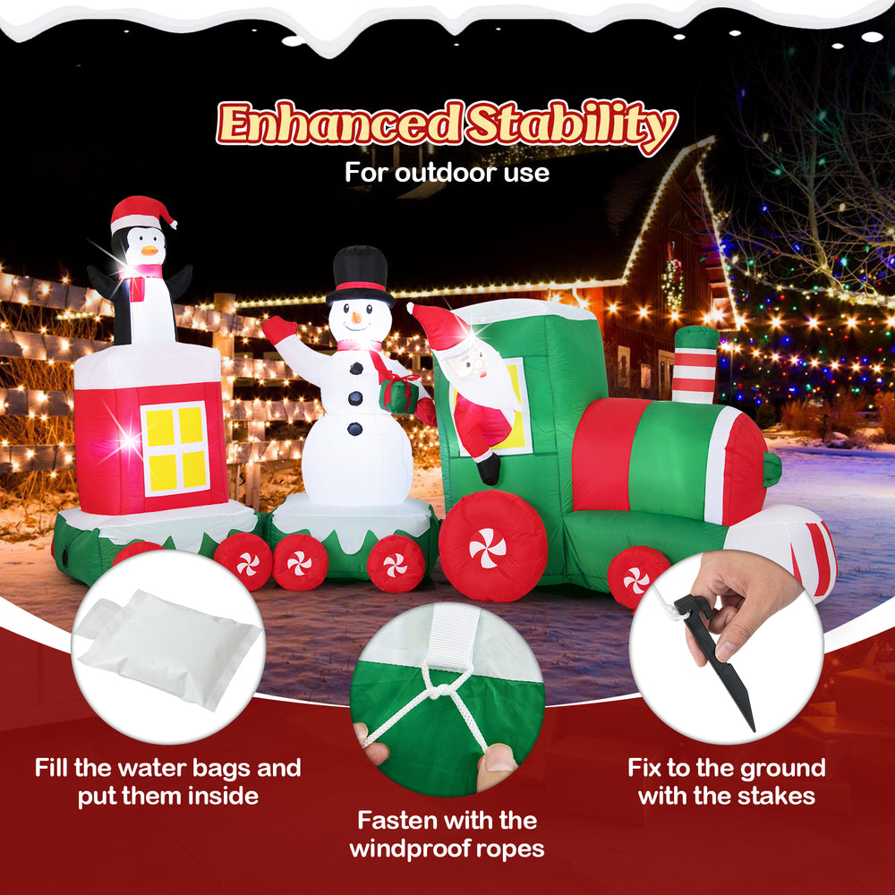 Christmas inflatable train featuring Santa, a snowman, and a penguin, made of weather-resistant polyester for outdoor.