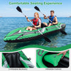 Two-person green inflatable kayak with aluminum paddles, featuring inflatable backrests for a comfortable seating.