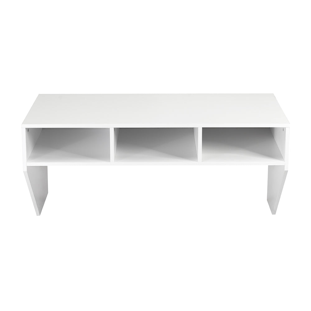 Wall-mounted white computer desk with three storage compartments, ideal for home or office organization.