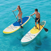 Two individuals paddling on 11 feet inflatable stand up paddle boards in vibrant colors, enjoying a sunny day on the.