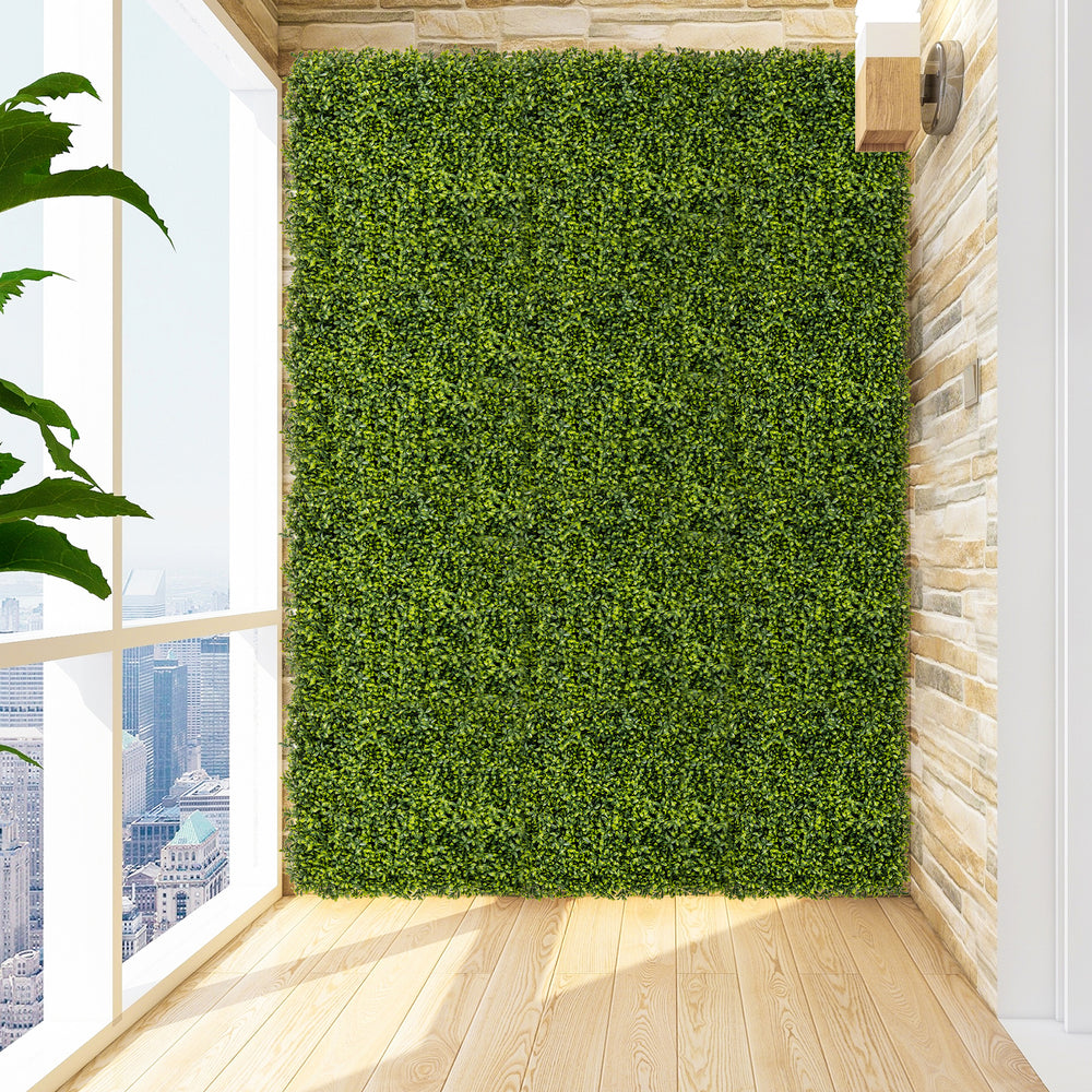 Artificial hedge boxwood panels in a bright green color, 20" x 20", ideal for creating privacy screens indoors or.