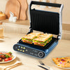 Panini press grill in blue with LED display, featuring 7 grilling modes and 180° opening for versatile cooking.