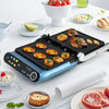 1200W blue panini press grill with LED display, showcasing grilled steak and vegetables, perfect for versatile cooking.