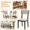 Modern dining chair with tilt backrest in black, featuring padded seat and elegant back pattern for versatile use.