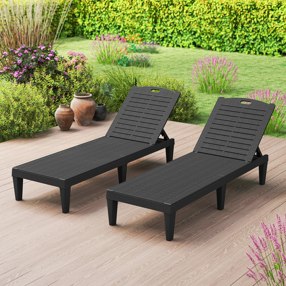 Black outdoor PP chaise lounge chairs set of 2 shown from the side, designed for sunbathing and easy transport.