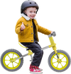 Child riding a 12-inch balance bike with adjustable seat and rotatable handlebar, perfect for developing balance skills.