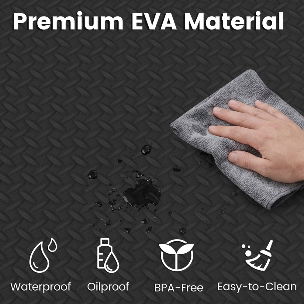 Black EVA foam exercise mat showing waterproof surface being cleaned, ideal for home workouts and floor protection.