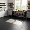 Black 12Tiles 1/2" puzzle exercise floor mats made of EVA foam, ideal for home fitness and easy to clean.