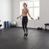 Black EVA foam puzzle exercise floor mats, ideal for home workouts, yoga, and protecting floors from damage.