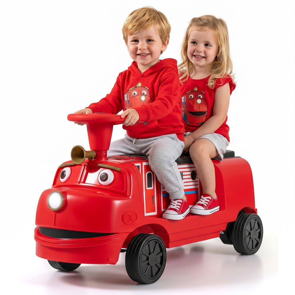 Two children riding a red 12V Chuggington train with adjustable seat, music features, and storage compartment.