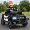 Black 12V RAM 3500 kids ride-on car with police lights, remote control, and safety features for outdoor fun.