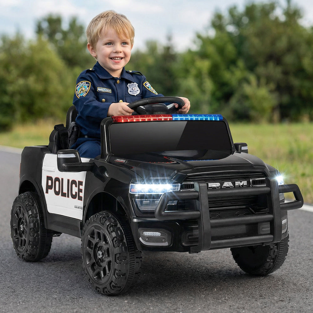 Black 12V RAM 3500 kids ride-on car with police lights, remote control, and safety features for outdoor fun.