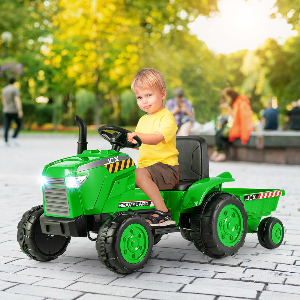 Green 12V kids ride-on tractor with detachable trailer, featuring manual and remote control for safe outdoor fun.