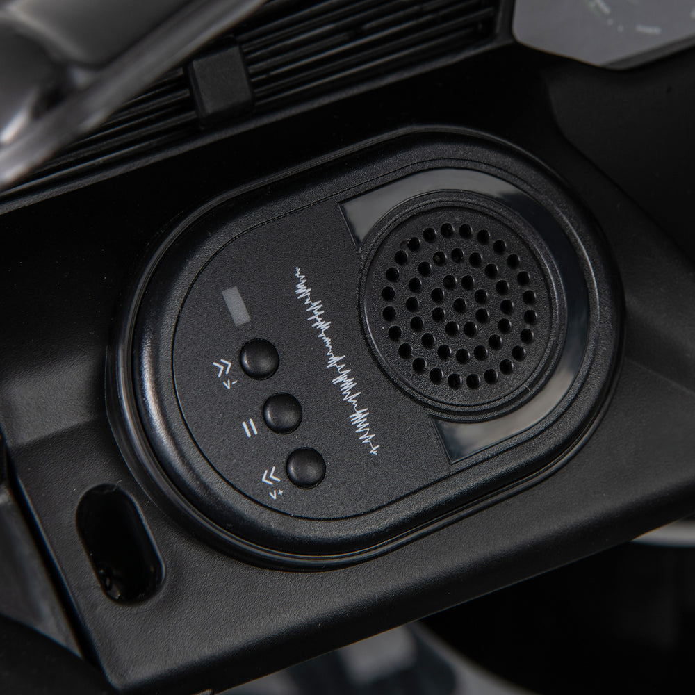 Multifunctional control panel of the 12V Kids Ride on Car Audi SQ8, featuring music play and volume control buttons.