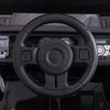 Anti-slip steering wheel of the 12V electric kids ride-on truck with remote control, designed for easy driving.