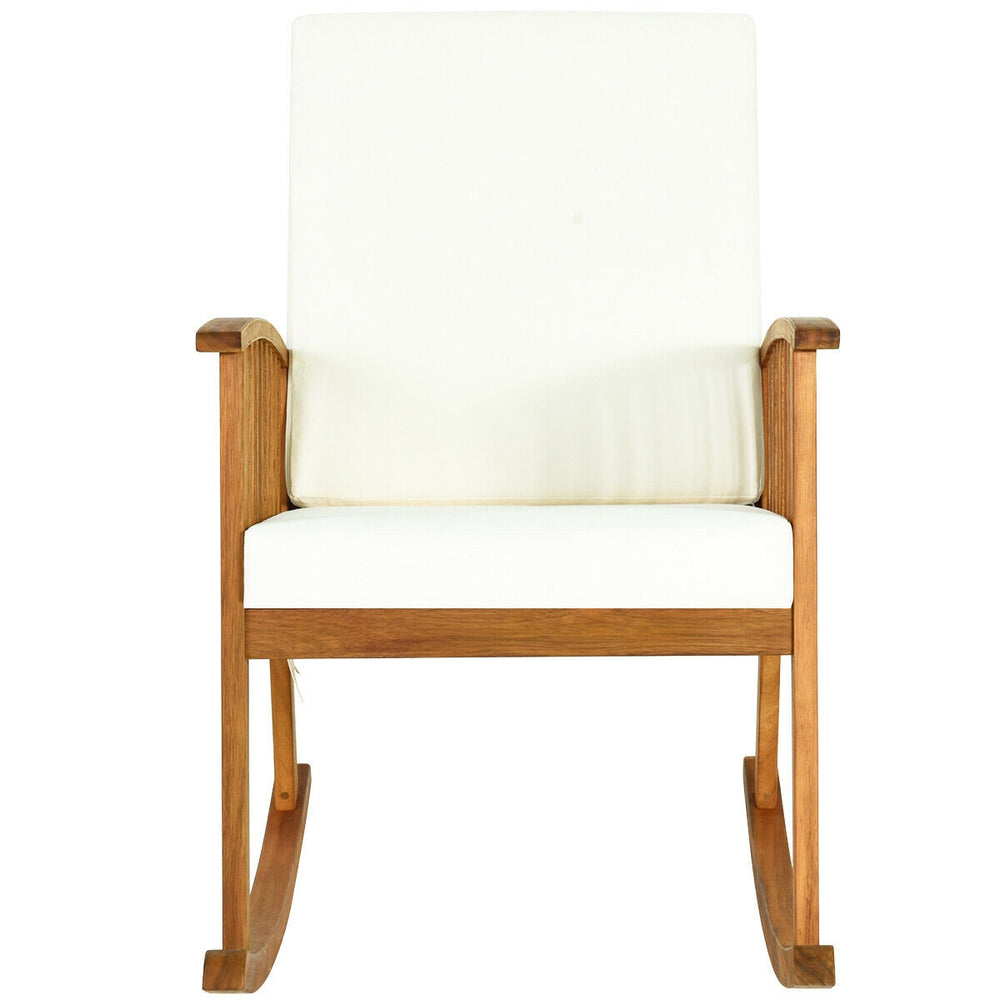 Outdoor acacia wood rocking chair with detachable washable cushions, featuring a sturdy frame and rustic teak color.