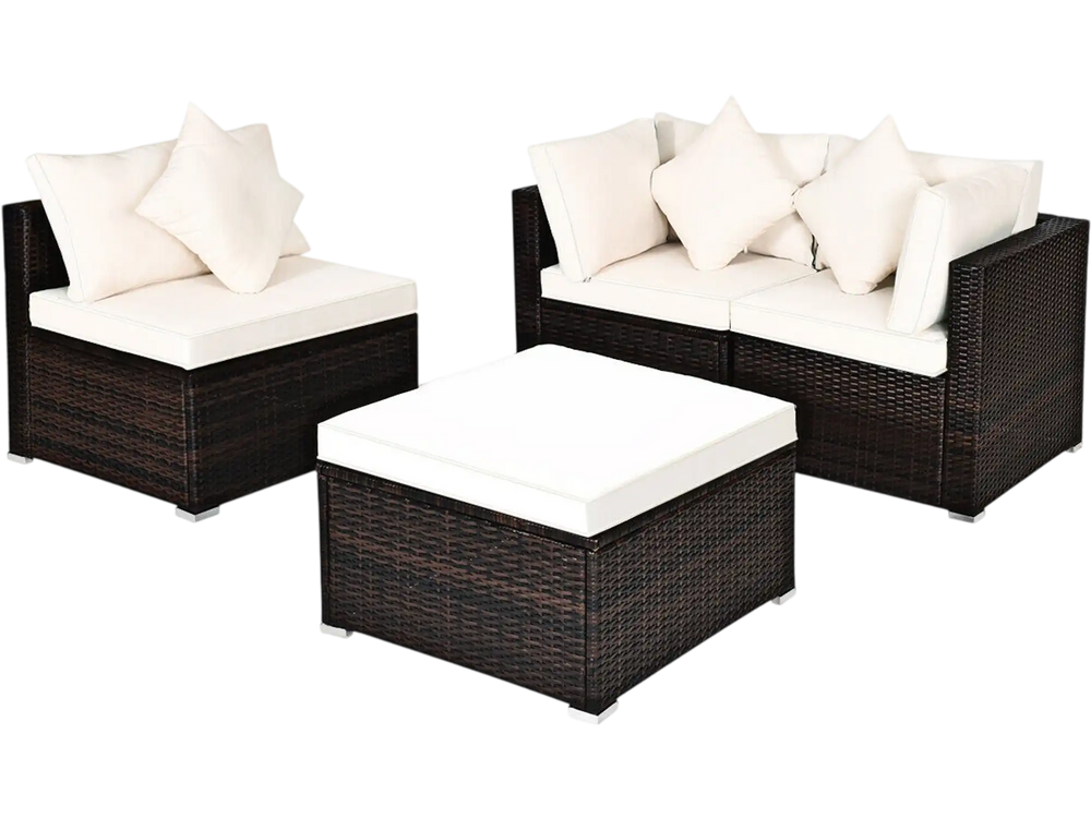 4-piece rattan wicker patio sofa set with white cushions, including 2 corner sofas, 1 armless sofa, and 1 ottoman.