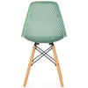 Green plastic hollow chair with beech wood legs, featuring a mesh design for breathability and ergonomic support.