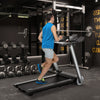 Side view of the Italian designed folding treadmill showcasing its compact design and heart rate monitor for home.