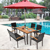 Acacia wood patio dining table with slatted surface, umbrella hole, and rust-proof legs, ideal for outdoor gatherings.