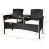 Wicker patio conversation set with removable cushions, featuring a durable steel frame and tempered glass table, ideal.