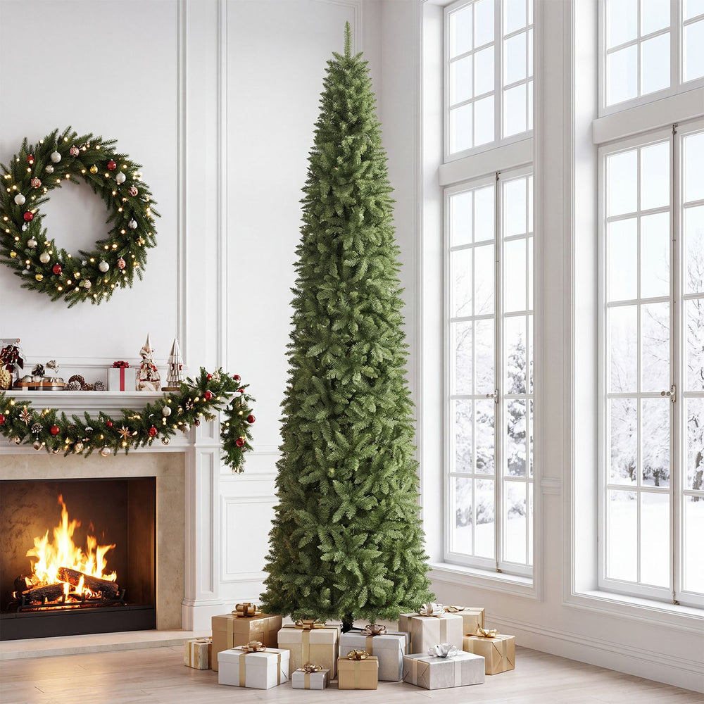 12 FT artificial Christmas tree with 1818 PVC branch tips, elegantly displayed beside a fireplace with holiday gifts underneath.