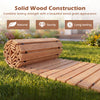 12 FT wooden garden pathway rolled out on grass, featuring sturdy solid wood construction for outdoor use.