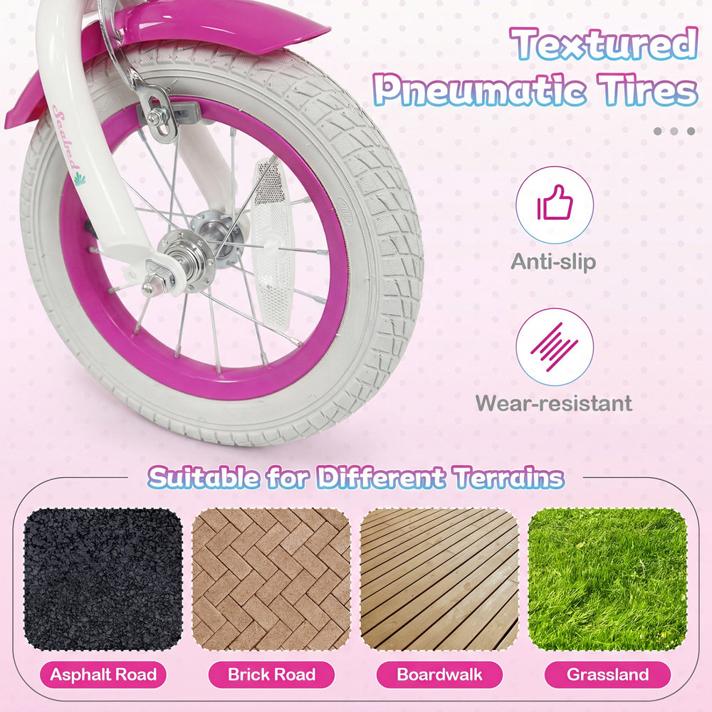 Textured pneumatic tires of the 12-inch kids bike in rose red, suitable for various terrains like asphalt and grass.