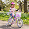 Purple 12-inch kids bike with adjustable seat, basket, streamers, and princess of the sea theme for outdoor fun.
