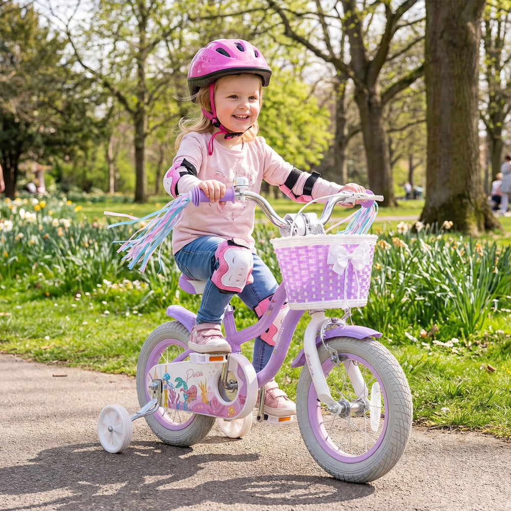 Purple 12-inch kids bike with adjustable seat, basket, streamers, and princess of the sea theme for outdoor fun.