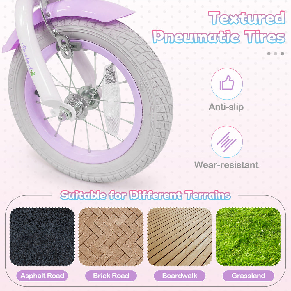 Textured pneumatic tire of a 12-inch kids bike in purple, suitable for various terrains like asphalt and grass.
