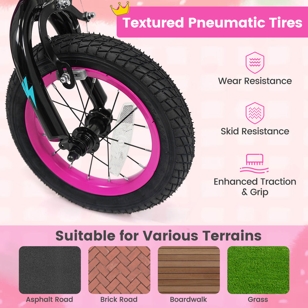 Textured pneumatic tire of a pink 12-inch kids bike, offering excellent traction and wear resistance for various.