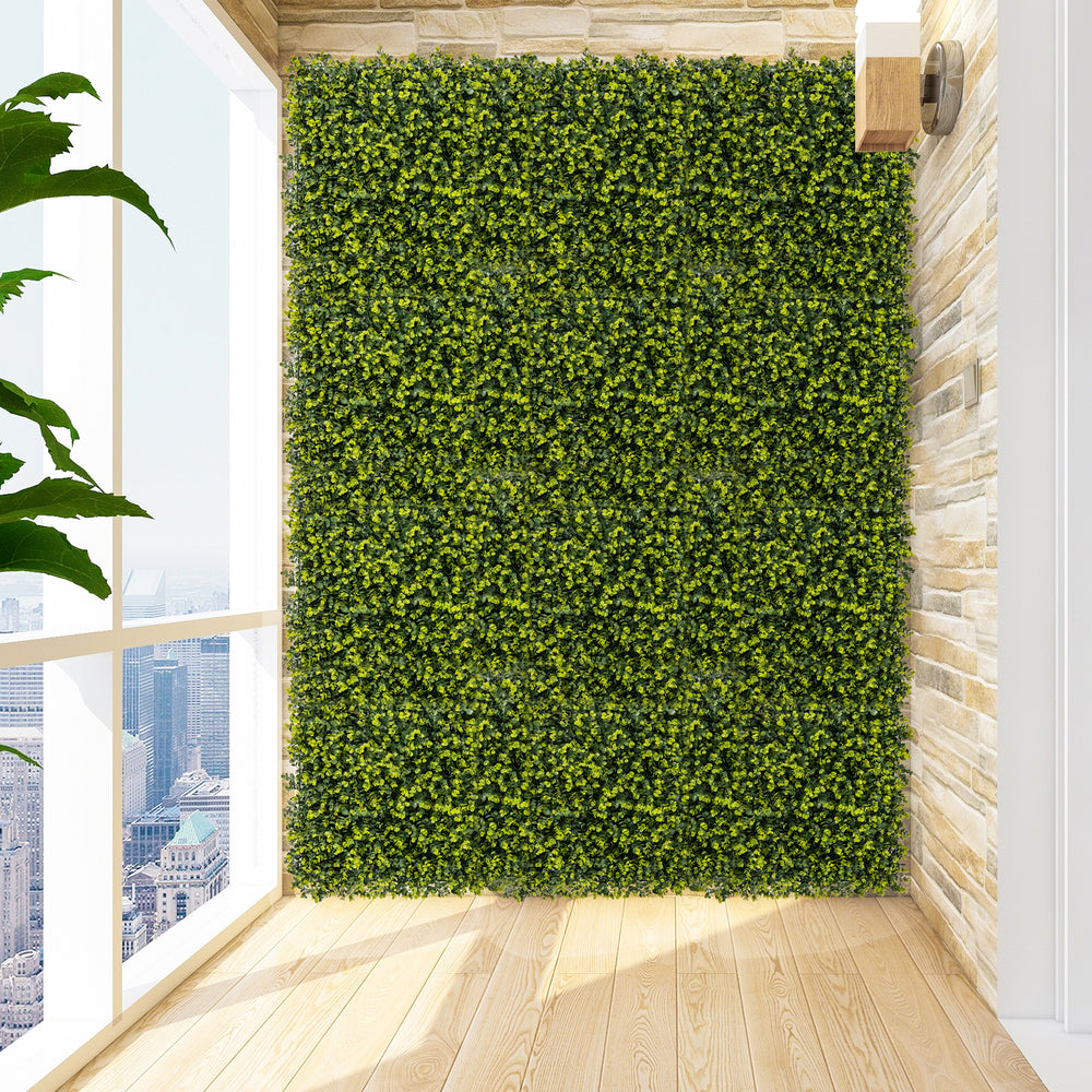 Artificial hedge eucalyptus panels in a bright green wall display, perfect for creating privacy screens indoors or.