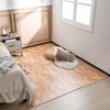 Wood grain foam floor mats with borders in a bedroom setting, ideal for indoor activities and floor protection.