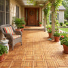 Acacia wood floor tiles arranged on a porch, ideal for outdoor use on patios, balconies, or poolside areas.