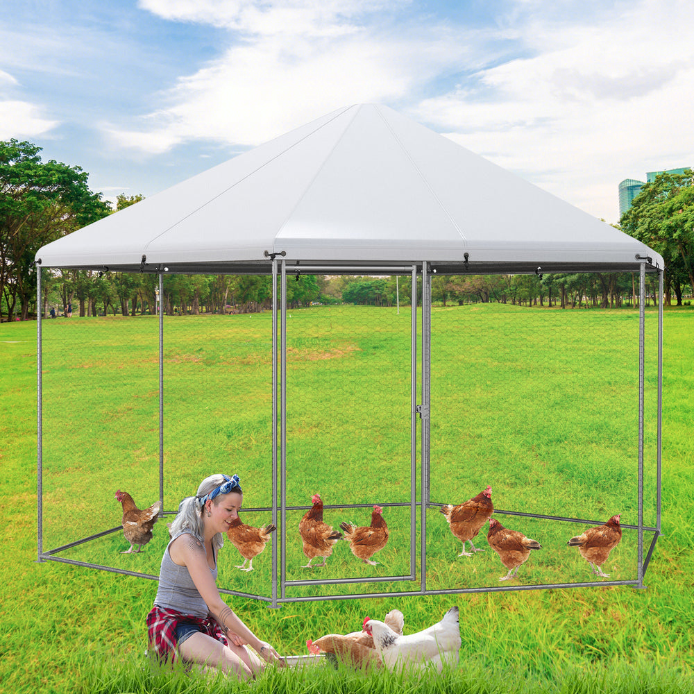Large hexagonal chicken coop with lockable door, durable steel frame, and wire mesh, ideal for outdoor poultry habitat.