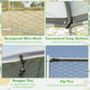 Hexagonal wire mesh detail with bungee ties and zip ties for securing the protective cover on a chicken coop.