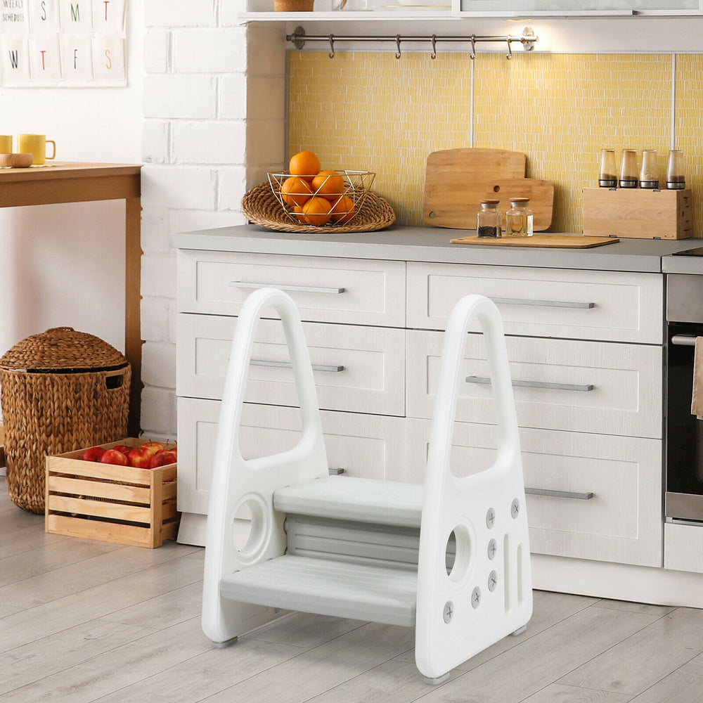 Kids step stool in gray with armrests, designed for potty training and independence, featuring non-slip steps and.