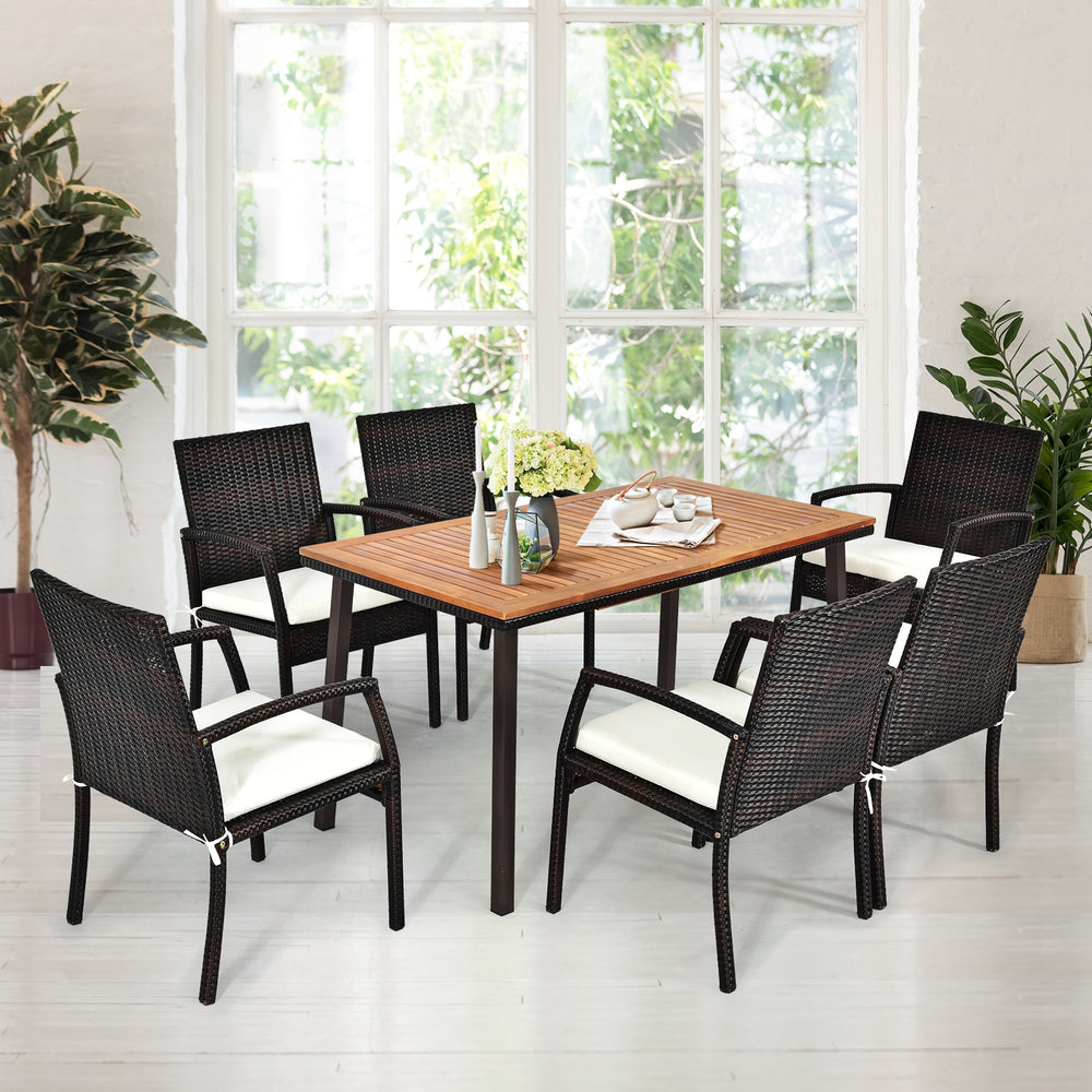 Acacia wood patio dining table with slatted surface and umbrella hole, seating 6-8 people for outdoor gatherings.
