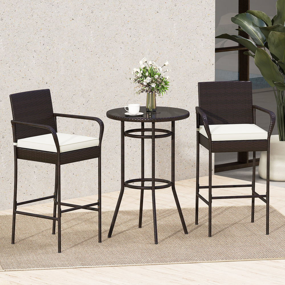Bar height table and chairs set with white cushions, made of PE wicker, perfect for outdoor porch relaxation.