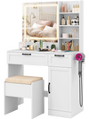 White vanity set with mirror, adjustable lighting, and storage, featuring a comfy stool for makeup organization.